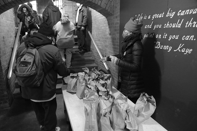 Soup Kitchen : St Luke's Lutheran Church : Hell's Kitchen : 2020 : Food Lines : Seventh Day Adventists Help the Needy : Streetlife : New York City : Times Square : Richard Moore : Photographer : Photojournalist